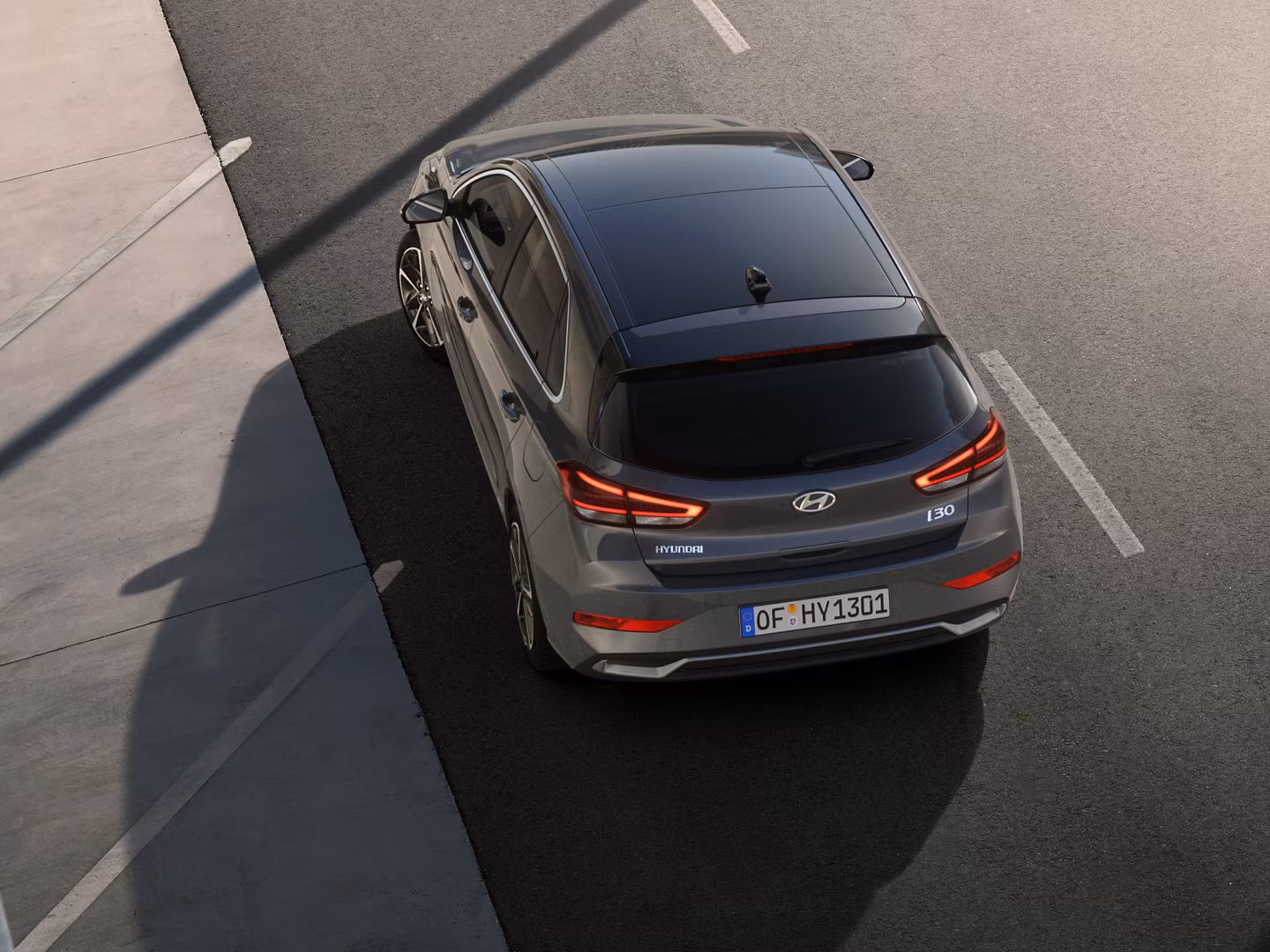 Driver looking trough the sunroof of the new Hyundai i30. 